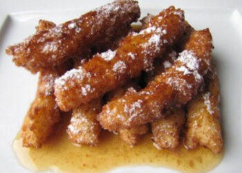 Crespelle di riso catanesi: una delizia siciliana da gustare tutto l'anno