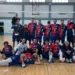 Giocatori dell'Asd Giarratana Volley che esultano dopo un punto durante la partita vinta in trasferta.