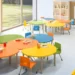 Aula scolastica moderna con arredi innovativi per bambini 0-6 anni, simile alle strutture finanziate dal Comune di Ragusa con fondi europei
