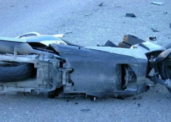 Ambulanza del 118 sul luogo dell'incidente tra auto e scooter in Via Nazionale a Modica all'intersezione con Via Trani