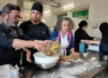 Studenti dell'Istituto Principi Grimaldi di Modica preparano le tipiche impanate di Pasqua durante un laboratorio.