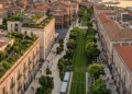 Progetto di rigenerazione urbana a Catania con aree verdi e pavimentazione drenante.