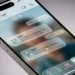 Dettaglio dell'interfaccia WhatsApp con il nuovo design Liquid Glass su uno smartphone.