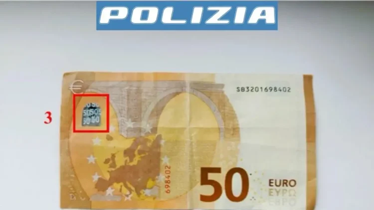Controllo di una banconota da 50 euro sospetta in un esercizio commerciale