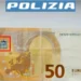 Controllo di una banconota da 50 euro sospetta in un esercizio commerciale