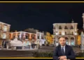 Centro storico di Comiso con attività commerciali e strada urbana