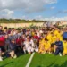 Calciatori del Modica Calcio festeggiano con la Supercoppa sul campo di Niscemi