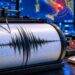 Illustrazione realizzata con Intelligenza Artificiale che rappresenta una sala di monitoraggio sismico notturna con sismografo, tracciato della scossa e schermi di analisi, in riferimento al terremoto magnitudo 6.2 registrato nel Tirreno meridionale