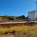 Impianto industriale di Irminio Srl con serbatoio e tubazioni, al centro della vertenza sugli stipendi arretrati