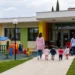 Ingresso di un asilo nido con area giochi esterna, immagine rappresentativa dei nuovi servizi per l’infanzia a Modica.