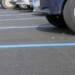 Parcheggio di Piazza Rabito a Marina di Ragusa con stalli di sosta e strisce blu