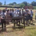 Un gruppo di partecipanti dell'Uici Ragusa ascolta la guida durante la visita al Parco archeologico di Giardini Naxos nell'ambito del progetto "Sicilia da Toccare"