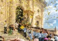 Portatori in azzurro reggono il fercolo della Madonna della Neve sotto una pioggia di coriandoli gialli a Giarratana