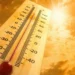 Termometro sotto un sole intenso che rappresenta l'ondata di caldo prevista in Sicilia, con temperature fino a 47 gradi.