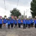 Partecipanti del Palio delle Contrade di Ragusa in contrada Puntarazzi sfilano con le lettere che compongono il nome della contrada davanti al pubblico.