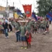 Partecipanti del Palio delle Contrade sfilano a Tre Casuzze con gonfaloni e un vitellino durante la prima tappa della seconda edizione a Ragusa.