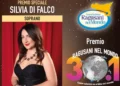 Premio Ragusani nel Mondo 2026 dedicata al soprano Silvia Di Falco, premiata con un riconoscimento speciale, con ritratto dell'artista e logo dell'associazione