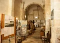 Interno della Chiesa di San Vito a Scicli con pannelli espositivi e allestimenti del museo storico-naturalistico curato da EsplorAmbiente.