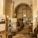 Interno della Chiesa di San Vito a Scicli con pannelli espositivi e allestimenti del museo storico-naturalistico curato da EsplorAmbiente.