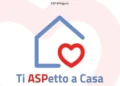 Logo del progetto "Ti ASPetto a Casa" dell'Asp di Ragusa con una casa stilizzata e un cuore rosso al centro