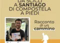 Antonio Giannone tiene in mano il documento con i timbri del Cammino di Santiago, seduto a bordo di un furgone