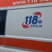 Ambulanza del servizio 118 Sicilia della Regione Siciliana, fiancata bianca con livrea arancione e logo.