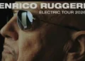Primo piano di Enrico Ruggeri con occhiali da sole sulla locandina dell'Electric Tour 2026