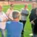 Sindaca e assessori di Modica a colloquio sul campo sintetico dello stadio Pietro Scollo durante il sopralluogo.