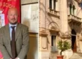Marco Lopes, consigliere di minoranza del Comune di Scicli, ritratto davanti alla bandiera municipale. A destra, il palazzo comunale di Scicli