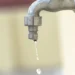 Rubinetto da cui gocciola acqua, immagine collegata all’interruzione idrica di Sampieri