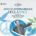 Locandina del Comune di Scicli e de Il Molo: il prof. Bruno Ficili con il braccio alzato, colombe blu e simbolo della pace