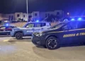 Auto dei Carabinieri, della Polizia di Stato e della Guardia di Finanza durante un controllo notturno