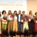 Palco della Giornata del Merito a Comiso con le rappresentanti delle associazioni premiate