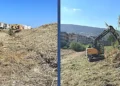 Escavatore al lavoro nell'alveo del fiume Ippari a Comiso durante i lavori di pulizia degli argini