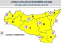 Mappa della Sicilia con le nove zone di allerta, dalla A alla I, tutte in giallo e simboli di temporali per il 23 settembre