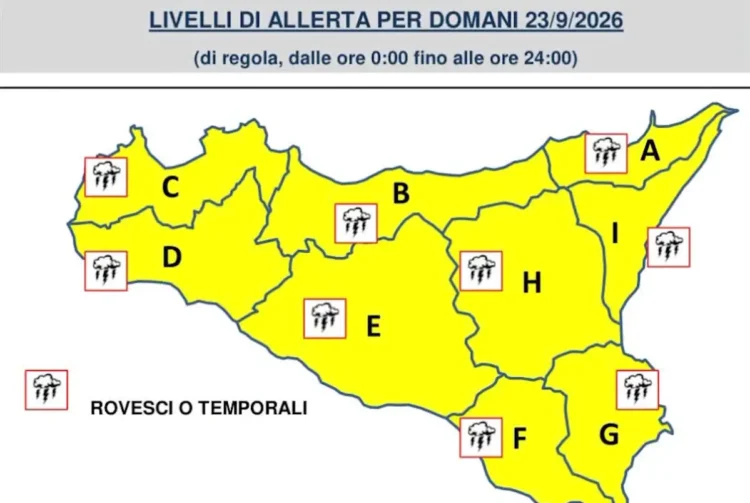 Mappa della Sicilia con le nove zone di allerta, dalla A alla I, tutte in giallo e simboli di temporali per il 23 settembre