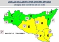Mappa della Sicilia divisa in zone di allerta: gialla per E, F, G e H nel centro-sud-est, verde nel resto, icone di temporali