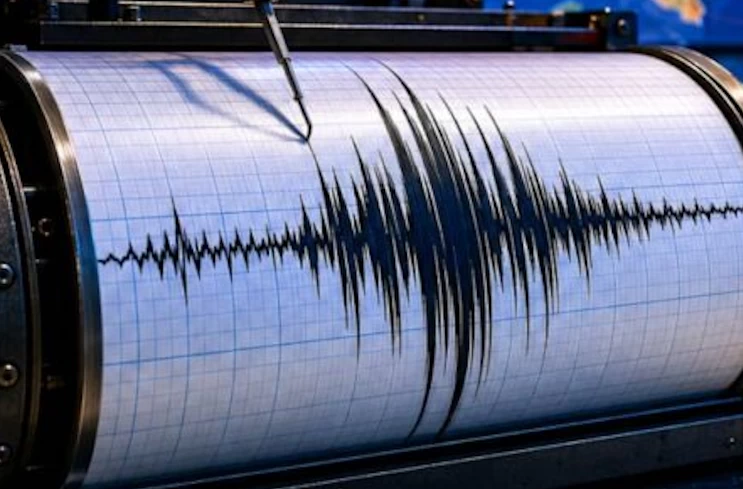Sismografo registra un terremoto, sullo sfondo mappa dell’Italia meridionale. Immagine generata con intelligenza artificiale