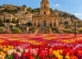 Tulipani davanti al Duomo di San Giorgio, Modica: illustrazione TuliPark Day. Immagine generata con intelligenza artificiale